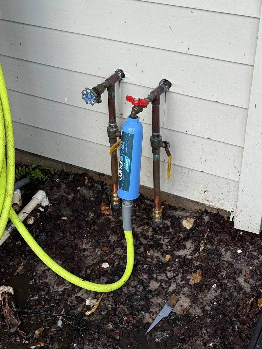 Water filter installed on a Palm City, FL home's water supply line by Blue Wave Home Services